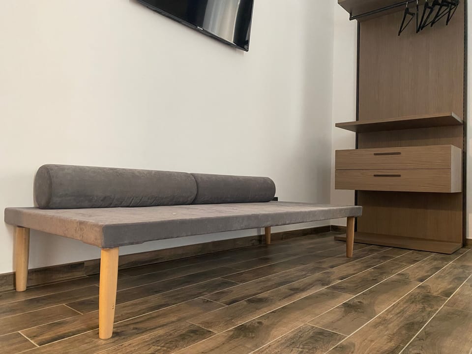 Deluxe Triple Room, Ensuite | Minibar, desk, blackout drapes, soundproofing
