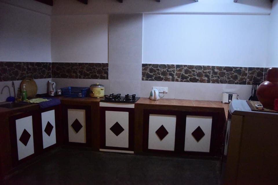 Deluxe Room | Shared kitchen | Stovetop, coffee/tea maker, electric kettle, rice cooker