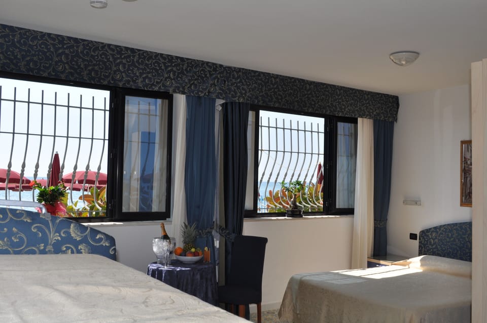 Quadruple Room | Minibar, in-room safe, desk, cribs (surcharge)