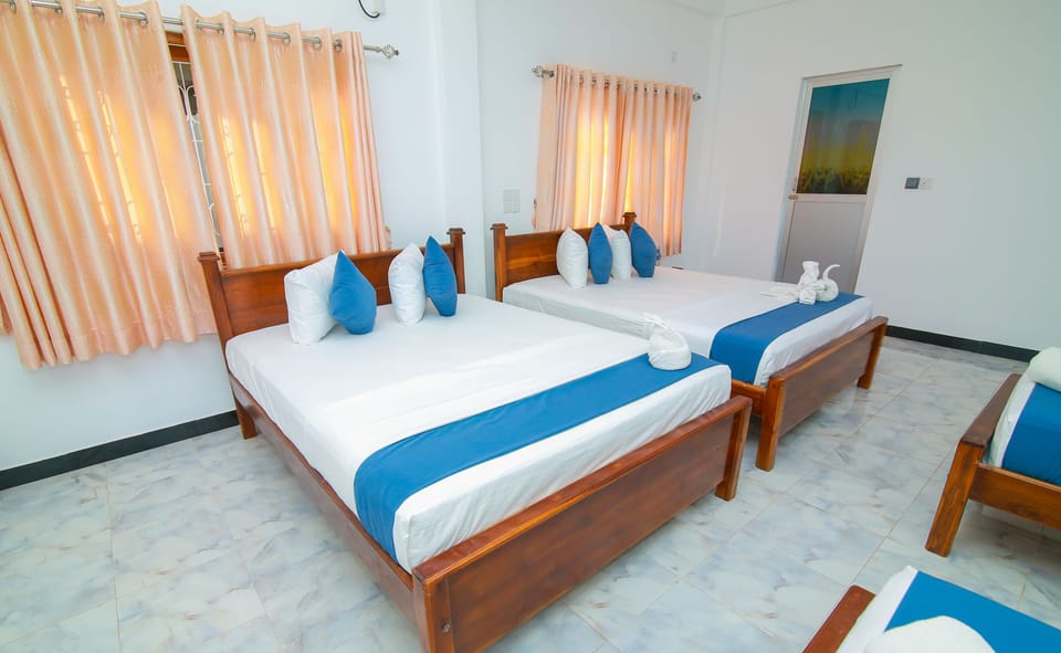 Family Room, Multiple Beds, Private Bathroom, Ground Floor | Individually furnished, desk, laptop workspace, soundproofing