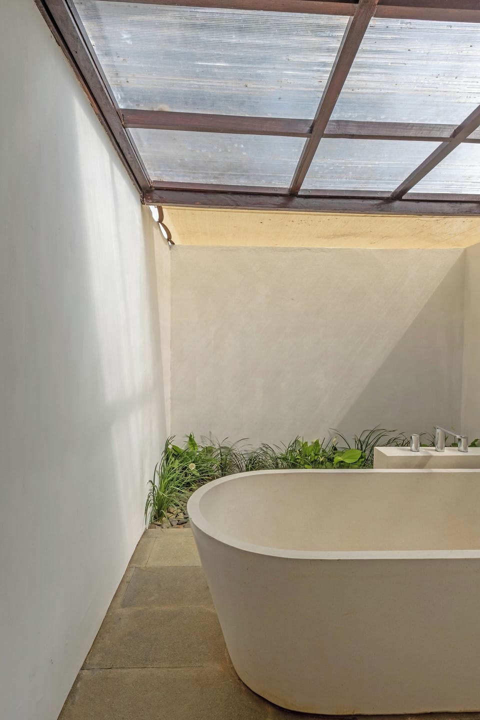 Separate tub and shower, rainfall showerhead, free toiletries
