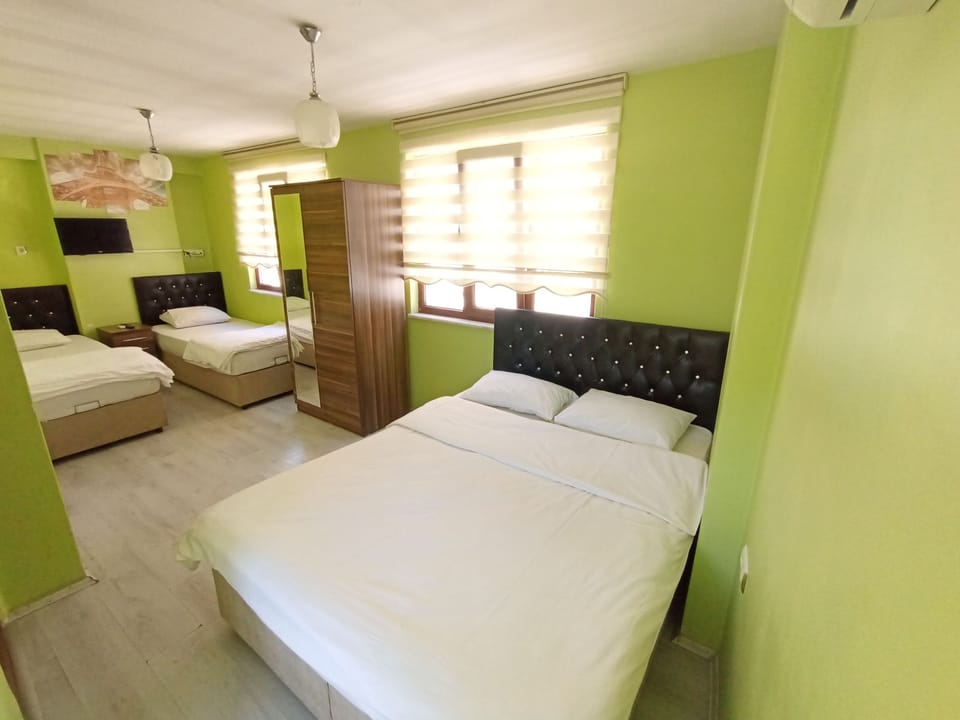 Economy Quadruple Room | Premium bedding, soundproofing, free WiFi, bed sheets