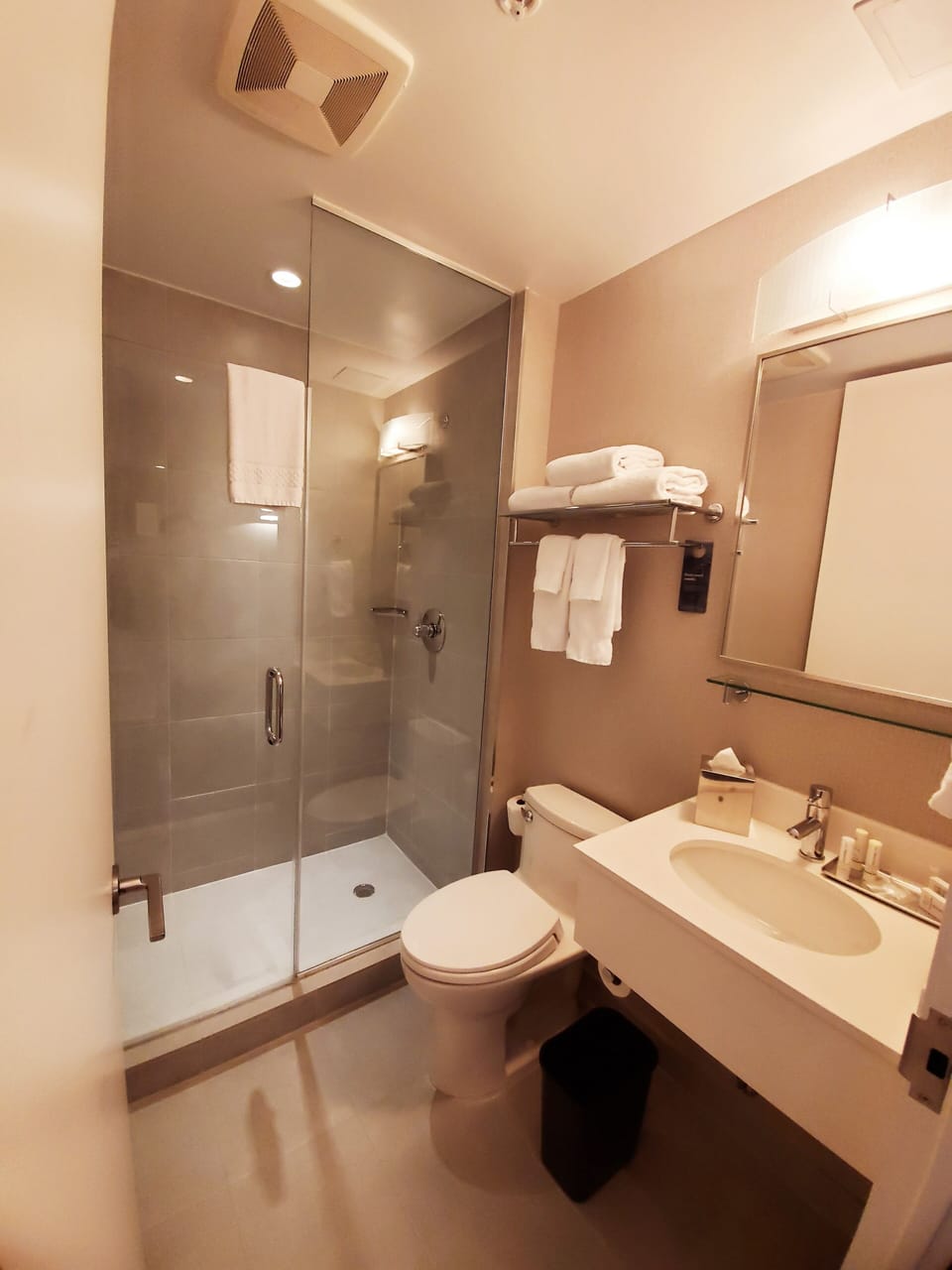 Designer toiletries, hair dryer, towels, soap