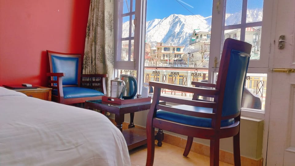 Classic Double Room | Pillowtop beds, in-room safe, iron/ironing board, free WiFi