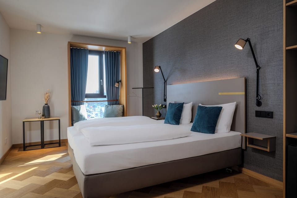 Deluxe Double Room, City View | Hypo-allergenic bedding, in-room safe, desk, laptop workspace
