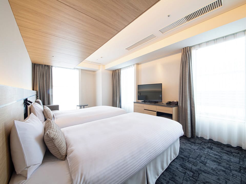 Moderate Twin Room, Non Smoking | In-room safe, blackout drapes, soundproofing, free WiFi