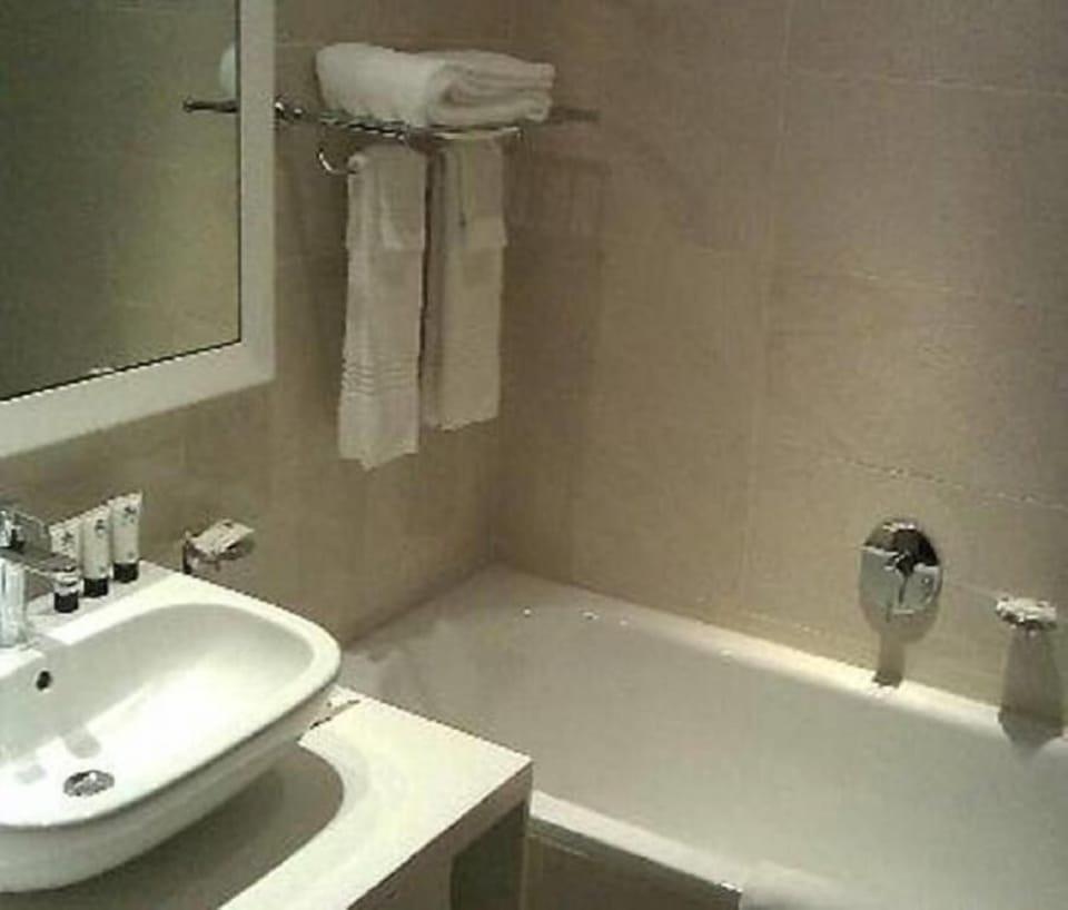 Shower, towels, shampoo, toilet paper