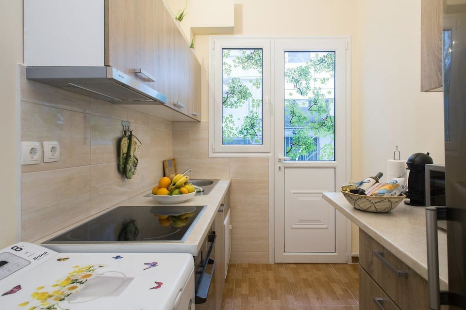 Apartment | Private kitchen | Full-size fridge, microwave, oven, stovetop