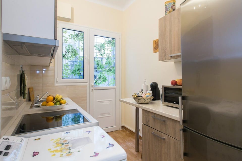 Apartment | Private kitchen | Full-size fridge, microwave, oven, stovetop