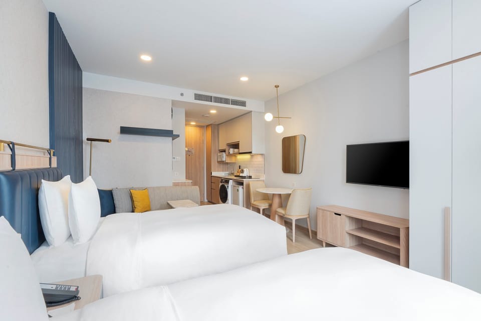Premium bedding, down comforters, in-room safe, desk