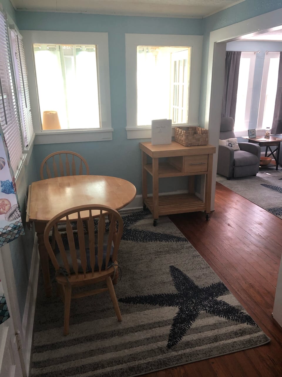 Dining area with newer table and chairs. 