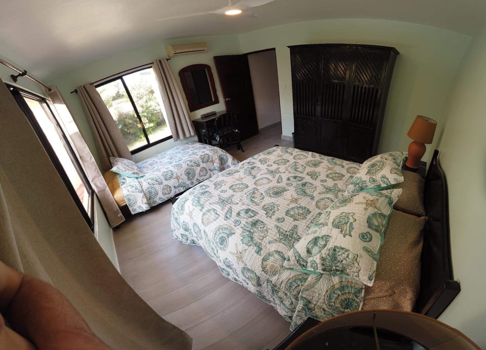 Spacious bedroom 2 with air conditioning.  Sleeps 3