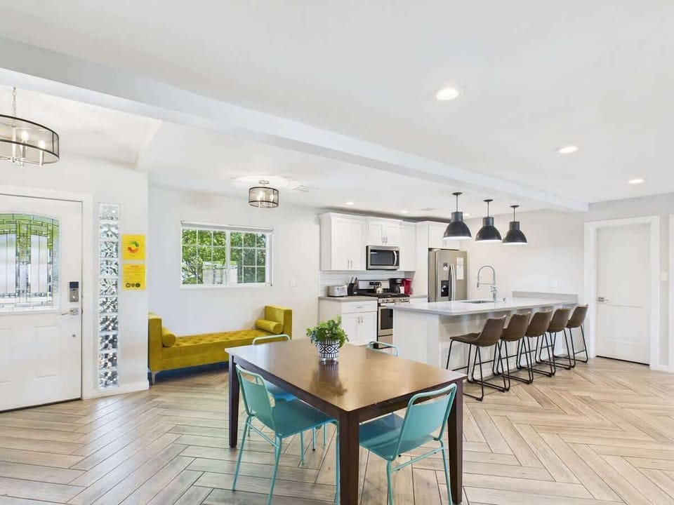 Cook in style with a fully equipped kitchen featuring sleek stainless steel appliances and ample space for meal prep.