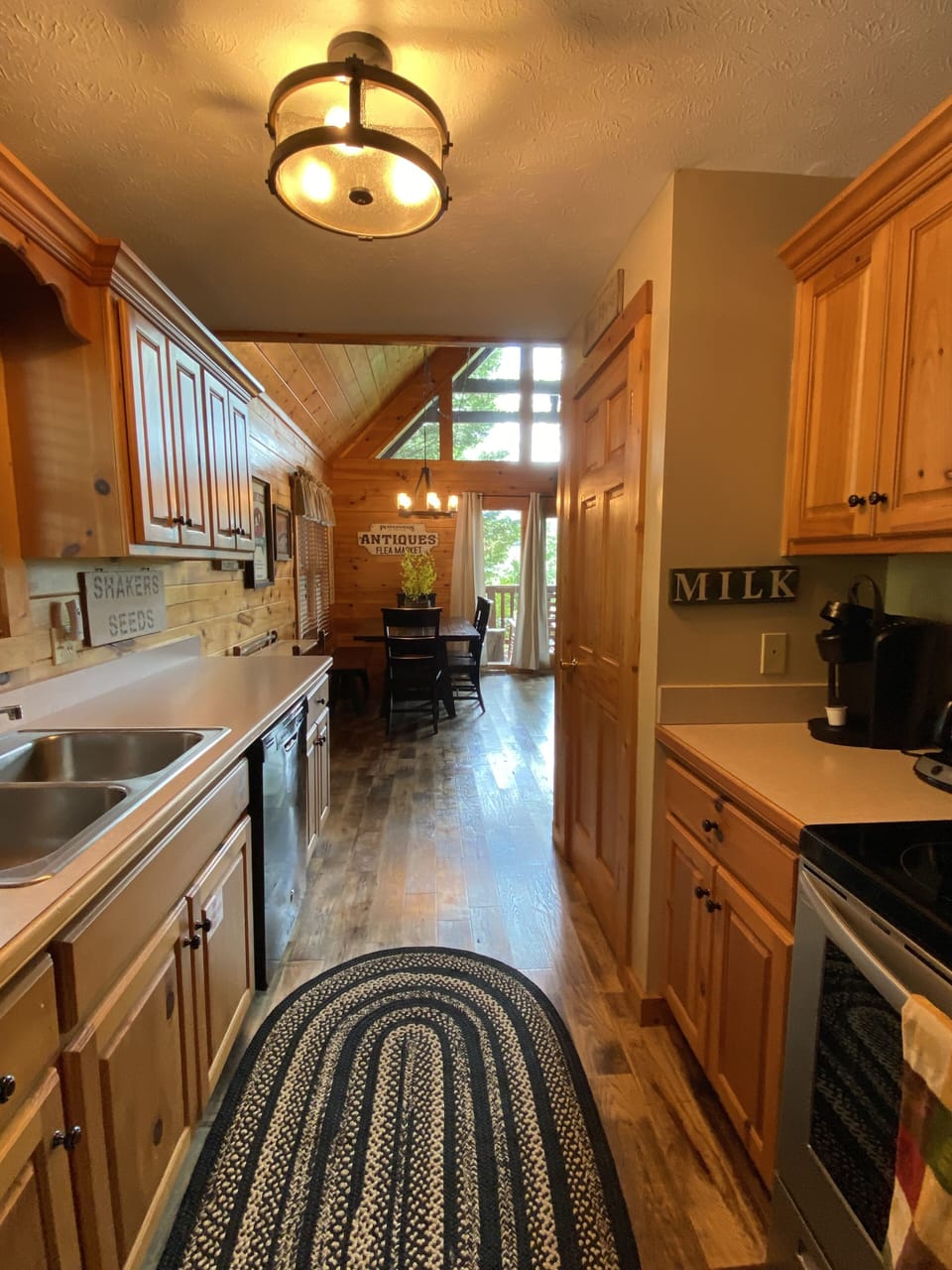 Cabin galley kitchen with stainless steel appliances!.