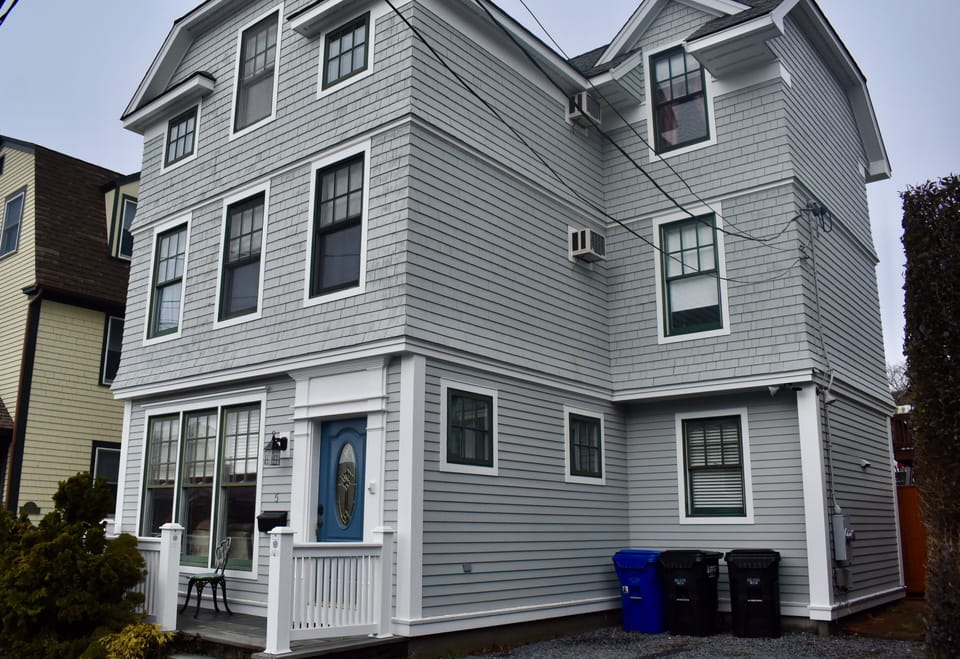 Front of house with 2-car driveway. We also provide 2 parking passes.