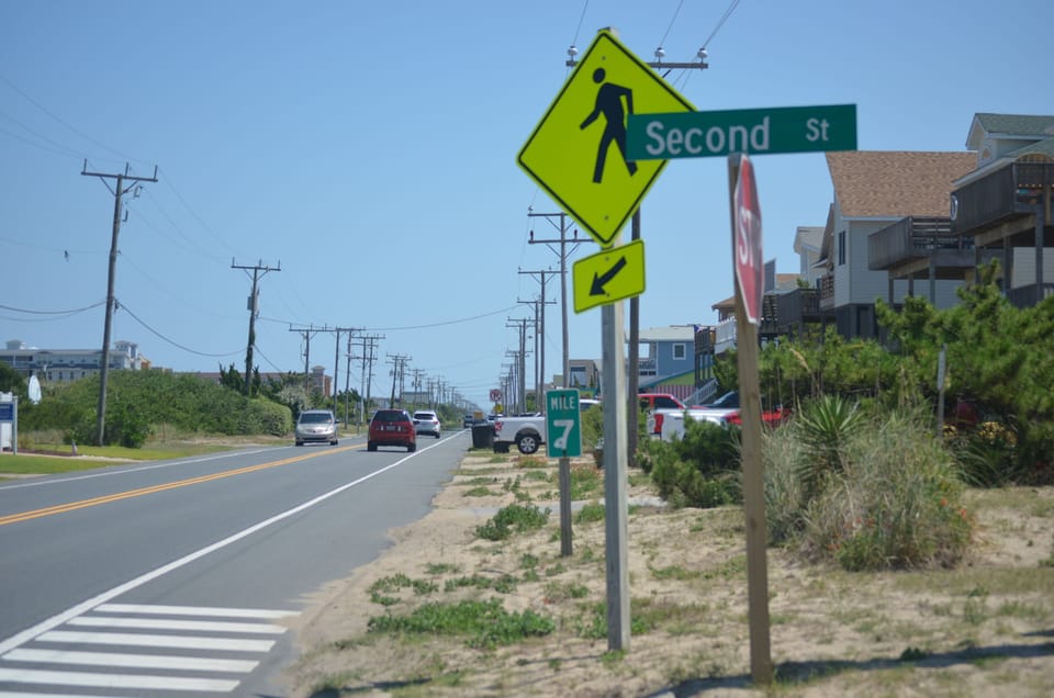 Pedestrian crossing right at the access gets you to local restaurants.