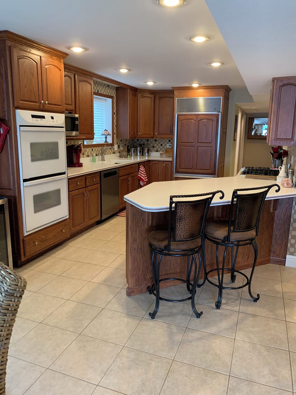 Kitchen on first floor near two bedrooms and pool