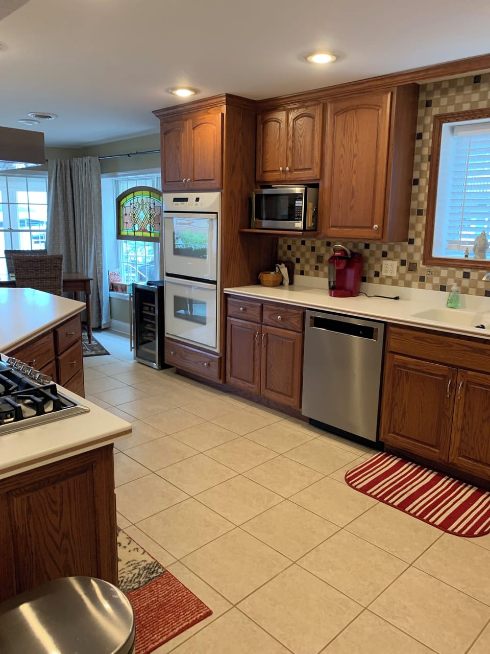 Kitchen on first level located by patio and pool