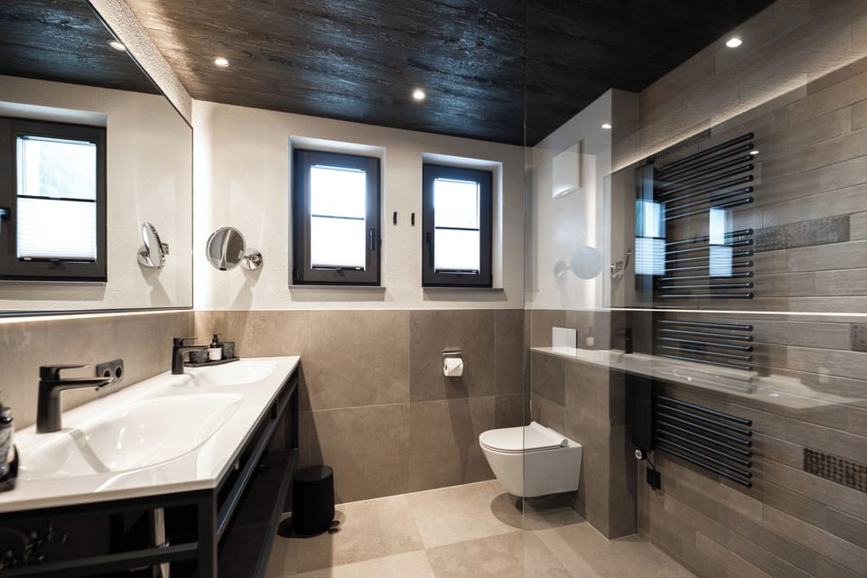 Shower, rainfall showerhead, designer toiletries, hair dryer