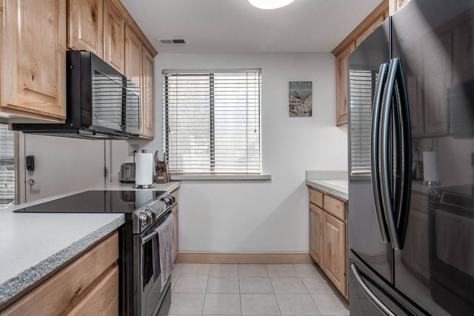 There's a coffee maker, dishwasher, toaster, iron, hair dryer, fire extinguisher, smoke detectors, carbon monoxide detectors.