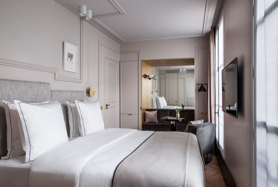 Deluxe Double Room | Minibar, in-room safe, desk, blackout drapes