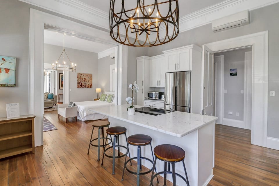 Open Fully Equipped Kitchen w/ Island seating for 4.