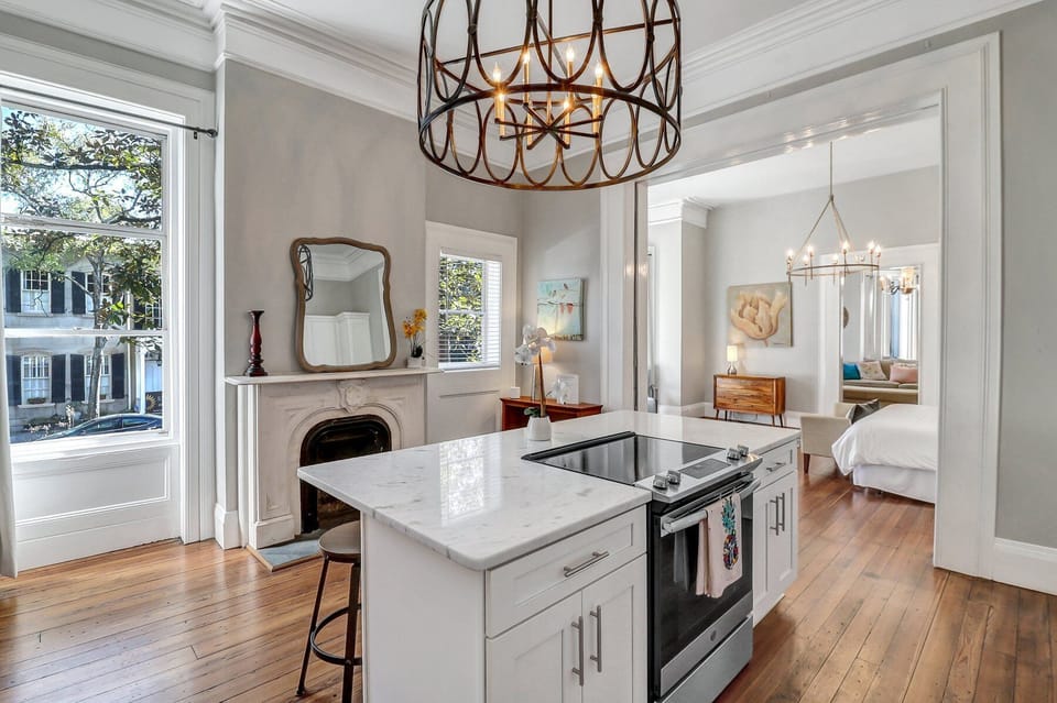Open Fully Equipped Kitchen w/ Island seating for 4.
