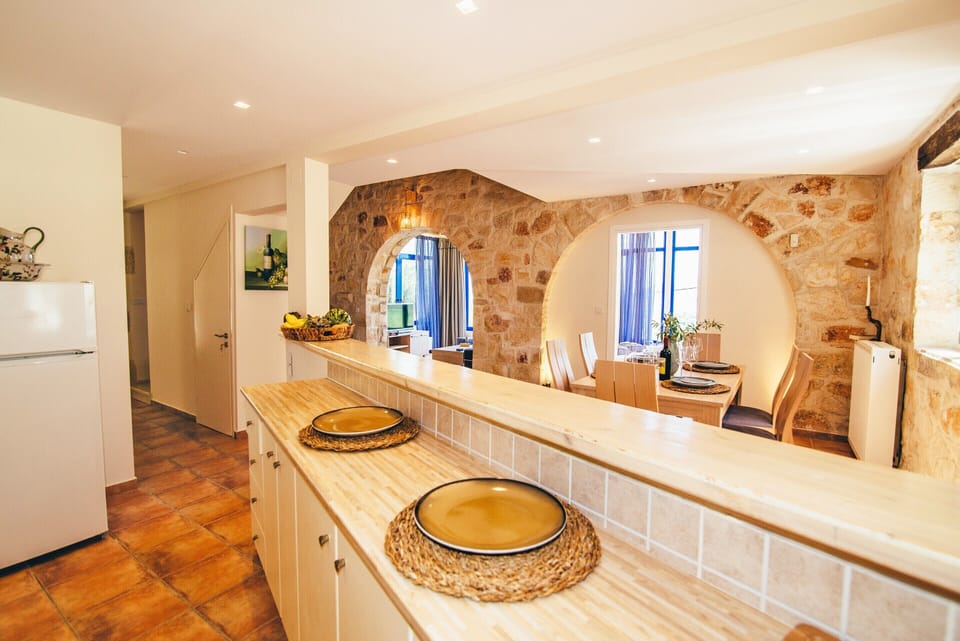 Villa | Private kitchen | Fridge, microwave, oven, stovetop