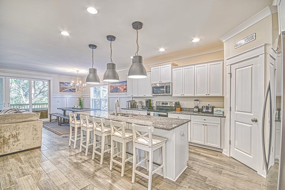 Fully Equipped Kitchen with all accessories and Island Seating for 5