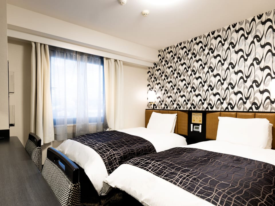Twin Room, Non Smoking | Desk, blackout drapes, free WiFi, bed sheets