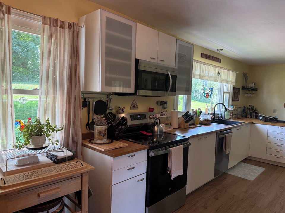 Kitchen with microwave and new stove/oven