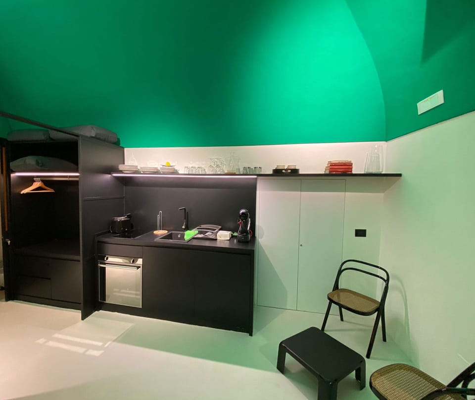 Deluxe Studio | Living area | Flat-screen TV
