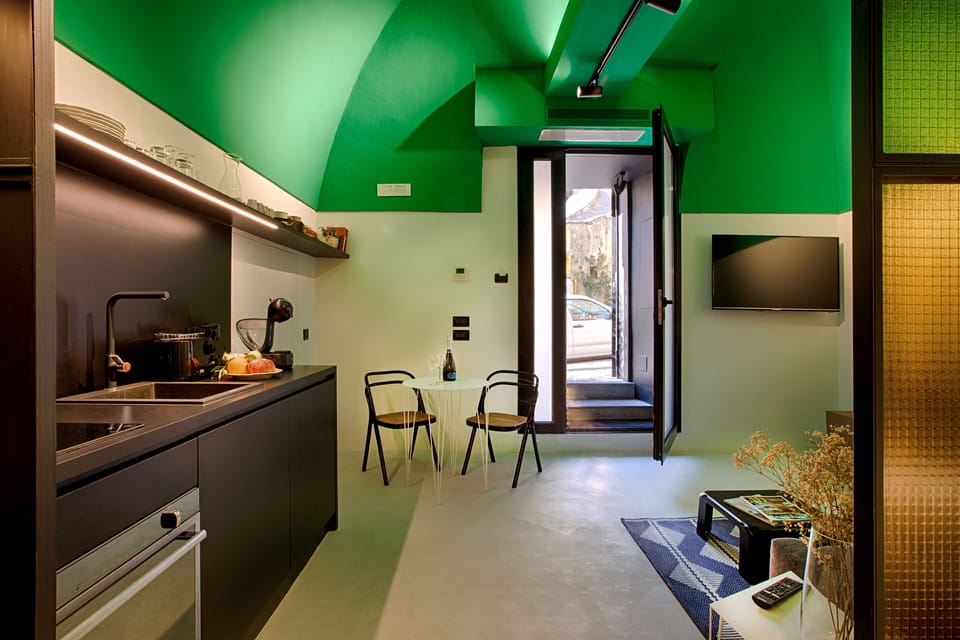 Deluxe Studio | Living area | Flat-screen TV