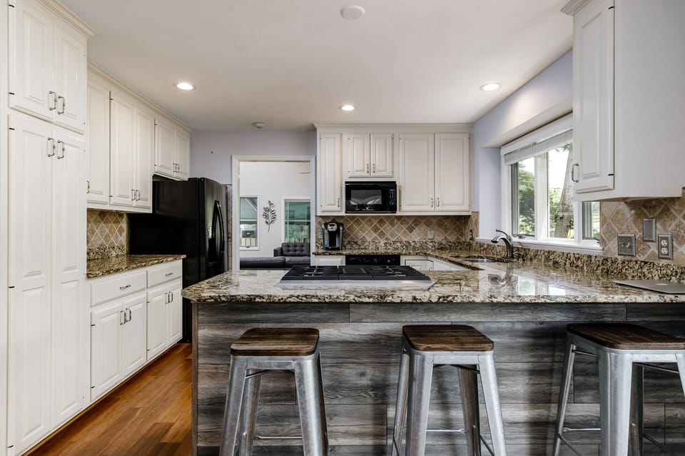 Huge Kitchen w/ Granite counters and stunning views of the golf course.