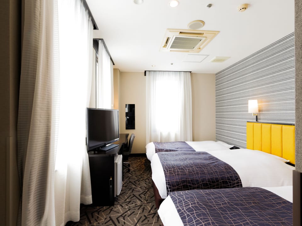 Desk, blackout drapes, free WiFi, bed sheets