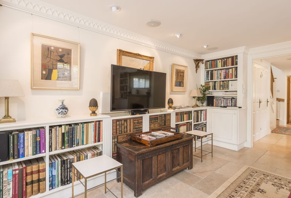 Church Cottage, Cattistock: The sitting room with 'hidden' television on display