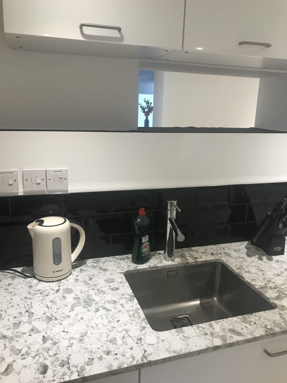 contemporary kitchen with marble worktop