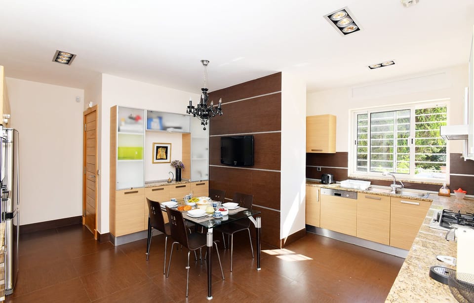 Villa | Private kitchen | Fridge, microwave, oven, stovetop