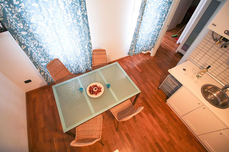 Marina di Grosseto - Lavanda Apartment - View of the dining room with kitchenette from the staircase leading to the private terrace