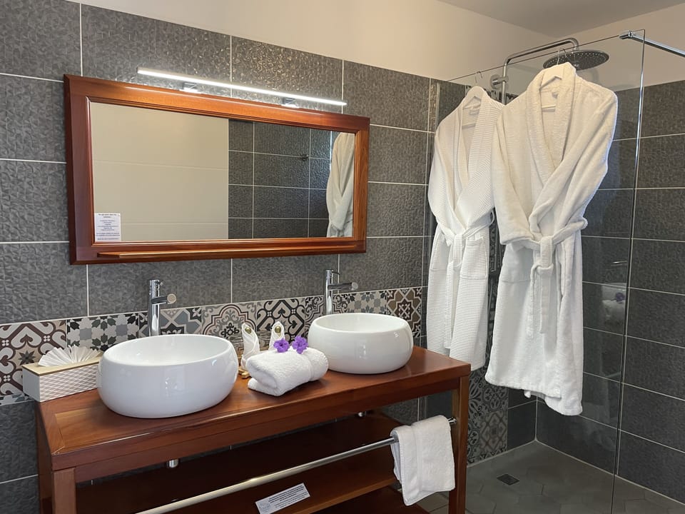 Romantic Room, Hot Tub | Bathroom | Shower, rainfall showerhead, hair dryer, towels