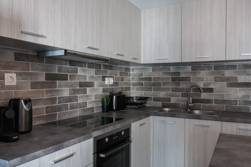 Apartment, 1 Bedroom, City View | Private kitchen | Full-size fridge, oven, stovetop, espresso maker