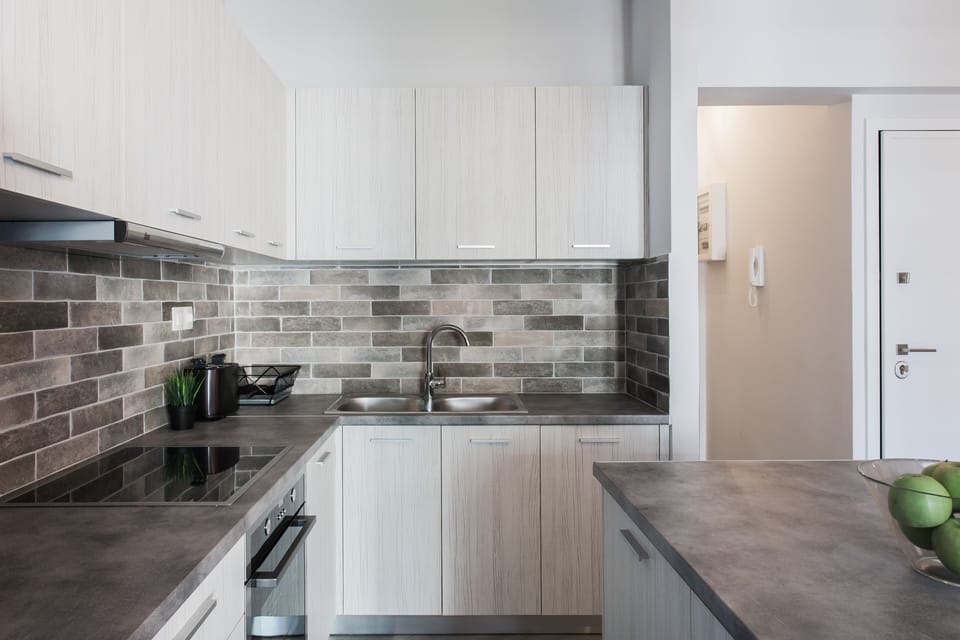 Apartment, 1 Bedroom, City View | Private kitchen | Full-size fridge, oven, stovetop, espresso maker
