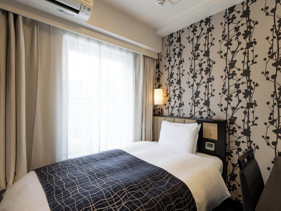Desk, blackout drapes, WiFi (free), bed sheets