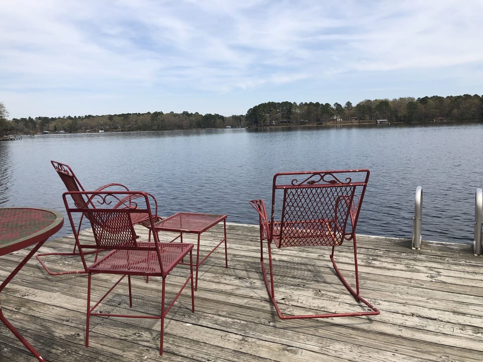 plenty of chairs on the dock for fishing and relaxing