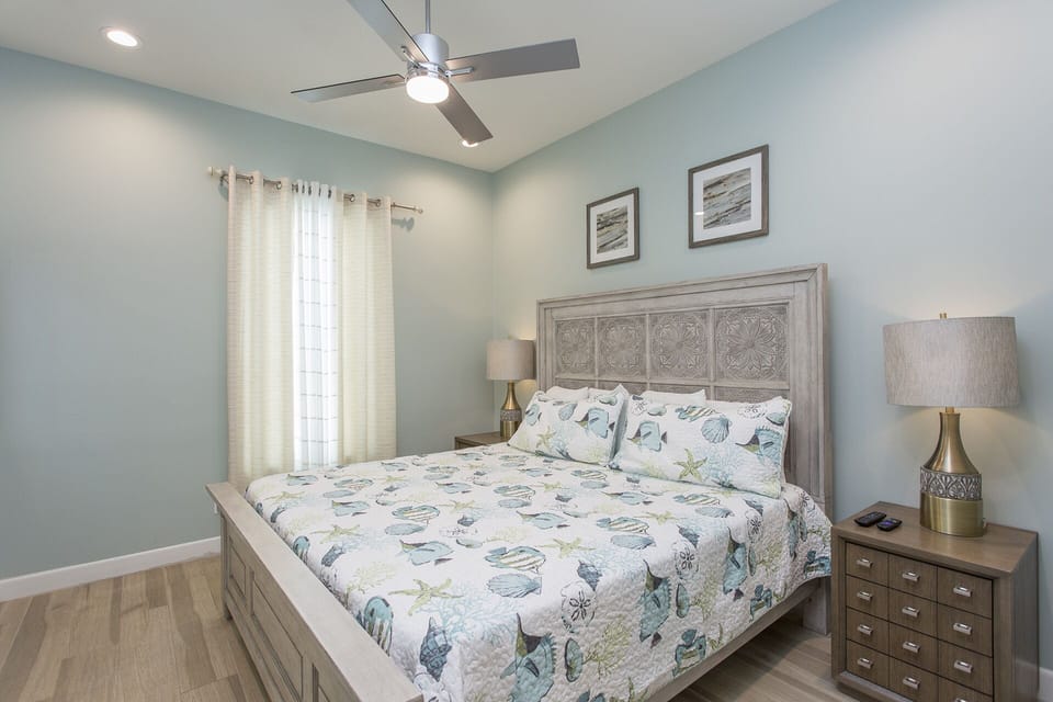 Ground floor guest bedroom with a King bed and en-suite.