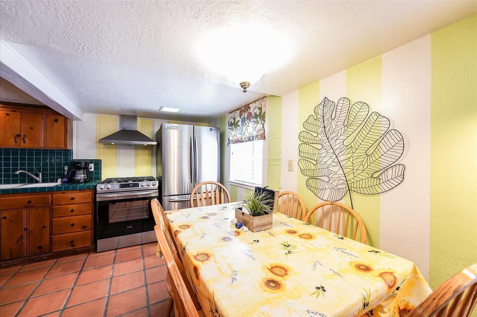 dining area with seating for 6; new stainless steel french door fridge/freezer