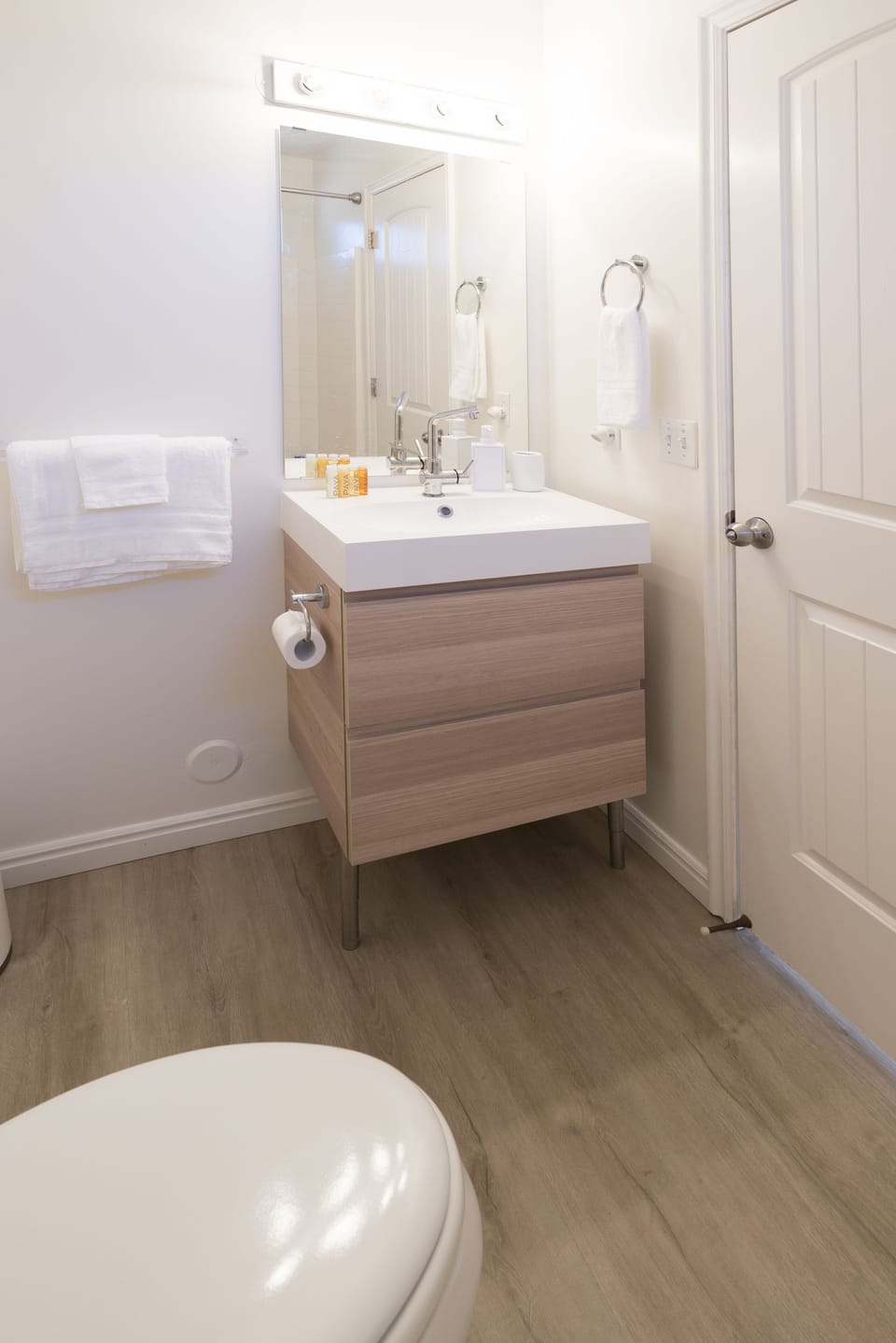 Master bathroom featuring new vanity & sink, toilet, shower & tub.