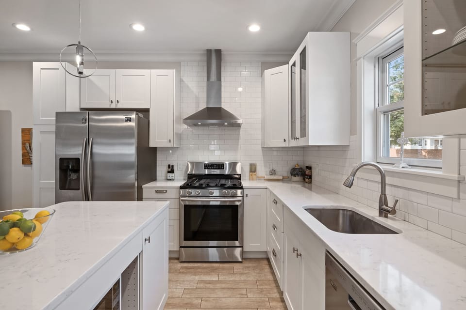 Stainless steel appliances, quartz countertops