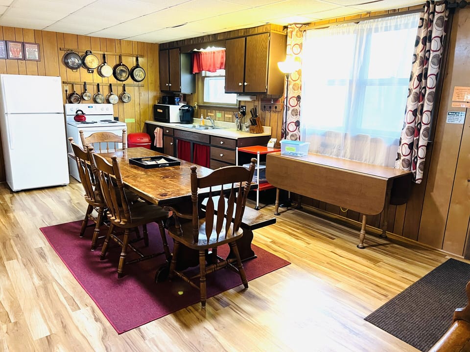 Plenty of seating that makes the kitchen table a great place to mingle! 