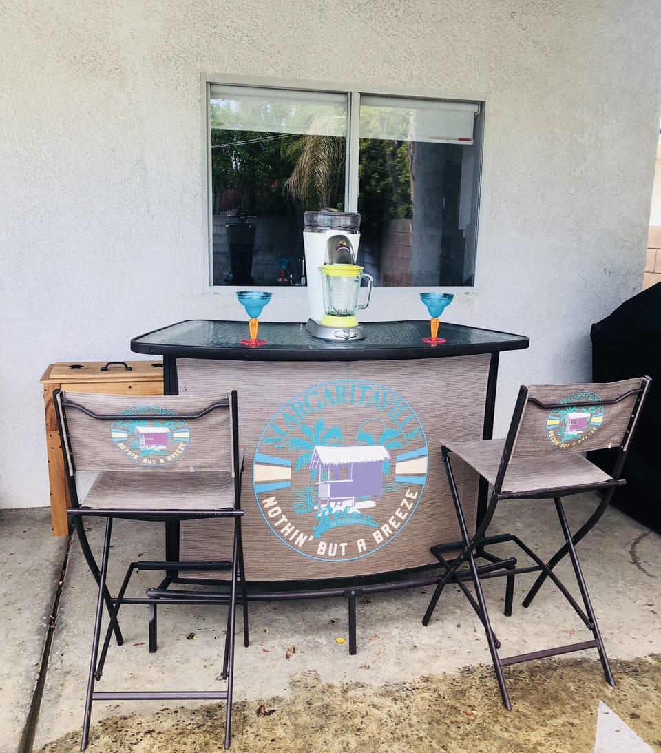 Cool off under the misters at the mini bar!